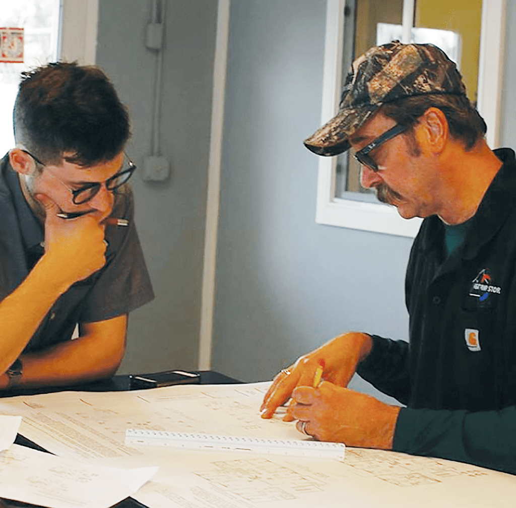 Main Commercial Picture Two Men Discussing